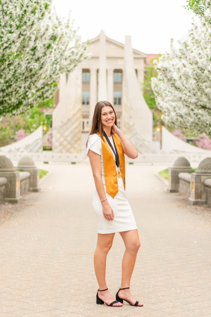 Purdue University grad photo standing in front of engineering fountain